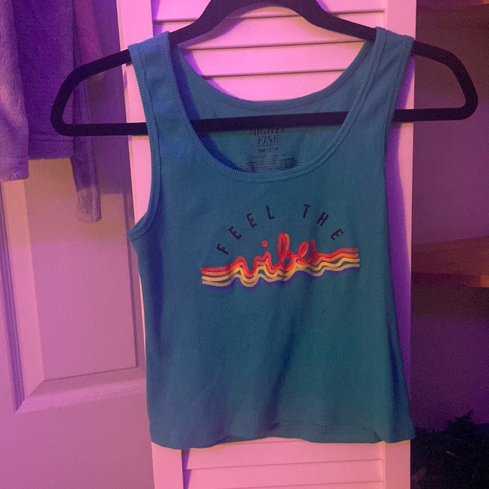 I am selling a cute crop top with a pretty real color perfect for summer fits.